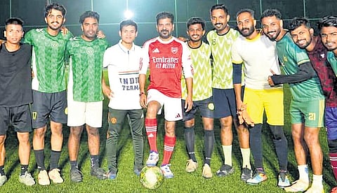 Chief Minister A Revanth Reddy poses for a photo during a practice session in Hyderabad on Sunday. A squad led by the CM is scheduled to take on a team comprising football legend Lionel Messi in a friendly match at the Uppal stadium on December 13.