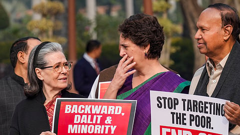 Congress leader Sonia Gandhi with party's General Secretary Priyanka Gandhi Vadra during a protest against Special Intensive Revision (SIR) outside the Parliament during Winter session, in New Delhi, Tuesday, Dec. 2, 2025.