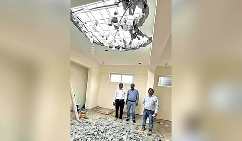Bengaluru East City Corporation engineers monitor the demolition
of an illegal floor in Whitefield.