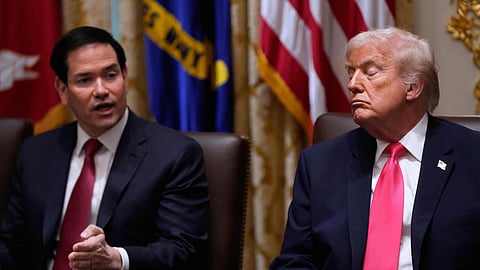 US Secretary of State Marco Rubio (R) speaks next to President Donald Trump during a Cabinet meeting at the White House on Tuesday, Dec. 2, 2025, in Washington.