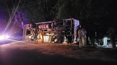 Tourist bus carrying students from GHSS, Thonnakal overturned at Nellappara in the wee hours of Wednesday.