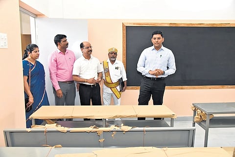 Collector K J Praveen Kumar and Setin Dilip Babu inagurating the new classrooms at the corporation school in Avaniyapuram | express