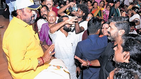 Union Minister Suresh Gopi interacting with people during a poll campaign event in Tripunithura on Thursday