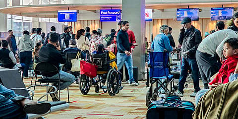 Passengers waiting at Terminal 1 (T1) of the Indira Gandhi International Airport, in New Delhi, Saturday, Dec. 6, 2025.