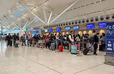 Passengers at Terminal 1 (T1) of the Indira Gandhi International Airport amid improvement in services following IndiGo flight disruptions, in New Delhi, Sunday, Dec. 7, 2025.