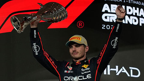 Red Bull driver Max Verstappen of the Netherlands reacts after winning the Abu Dhabi Formula One Grand Prix in Abu Dhabi.