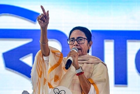 West Bengal Chief Minister Mamata Banerjee addresses a public meeting at Rash Mela Ground, in Cooch Behar, West Bengal, Tuesday, Dec. 9, 2025.