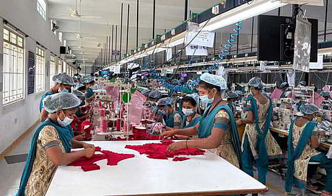 09.12.2025: Tiruppur: Workers engaged in production at a private knitwear manufacturing company in Tiruppur.