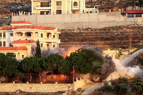 Smoke billows from the site of an Israeli airstrike that targeted the southern Lebanese village of al-Mjadel on December 4, 2025.