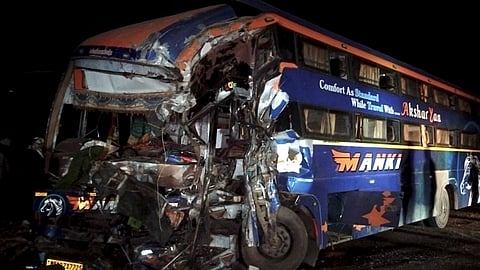 Damaged remains of a bus after it collided with a truck on the Jaipur-Bikaner National Highway, Tuesday night, Dec. 9, 2025. Four people died and several injured in the incident.