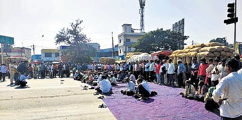 Farmers blocking NH-53 at Remed chowk in Sambalpur on Friday
