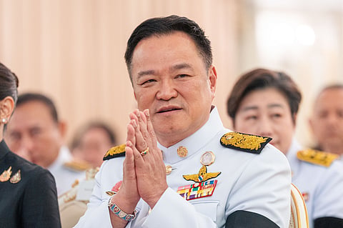 Thailand's Prime Minister Anutin Charnvirakul gestures as he attends an event at the government house in Bangkok, Thailand, Friday, Dec. 12