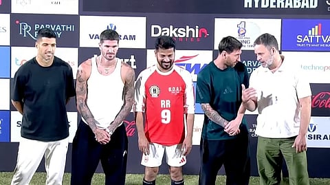Congress president Rahul Gandhi (R to L) along with Lionel Messi, Telangana CM Revanth Reddy, Rodrigo de Paul and Luis Suarez.