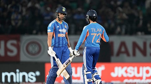 Shivam Dube, left, and Tilak Varma greets each other after India won the match during the third T20 cricket match between India and South Africa in Dharamshala, India, Sunday, Dec. 14, 2025.