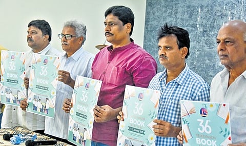 Organisers holding the flyer of 36th Book Festival during the press meet in Vijayawada.