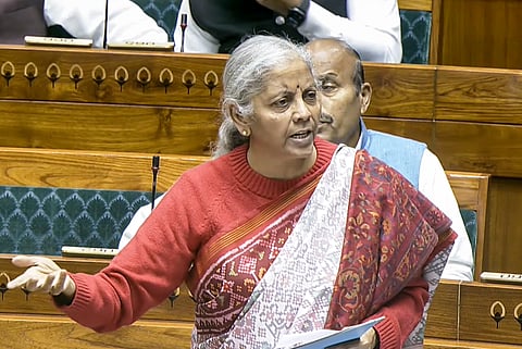 Finance Minister Nirmala Sitharaman speaks in the Lok Sabha during the Winter session of Parliament, in New Delhi, Tuesday, Dec. 16, 2025.