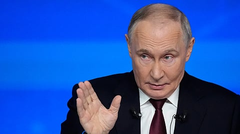 Russian President Vladimir Putin gestures while speaking during his annual news conference and call-in show at Gostinny Dvor, in Moscow, on Friday, Dec. 19, 2025.