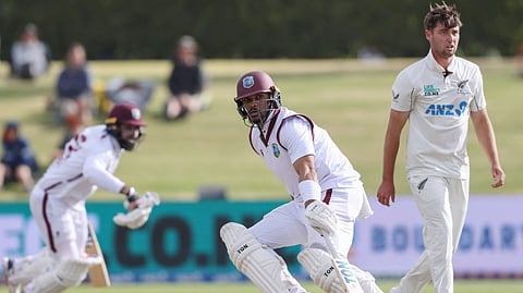 West Indies' Brandon King (C) makes a run during day two of the third international Test cricket match between New Zealand and West Indies at Bay Oval in Mount Maunganui on December 19, 2025.
