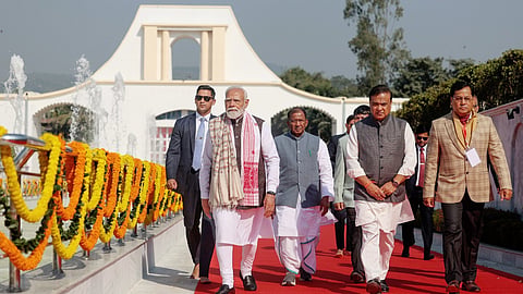 Prime Minister Narendra Modi, with Assam Governor Lakshman Prasad Acharya, Chief Minister Himanta Biswa Sarma, and Union Minister Sarbananda Sonowal, arrives at Swahid Smarak Kshetra at Paschim Boragaon to pay tribute, in Guwahati on Sunday.