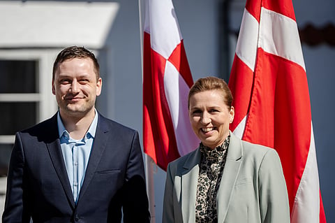 Denmark's Prime Minister Mette Frederiksen, right, and Greenland's Prime Minister Jens-Frederik Nielsen smile during their meeting at Marienborg in Kongens Lyngby, Denmark, on April 27, 2025.