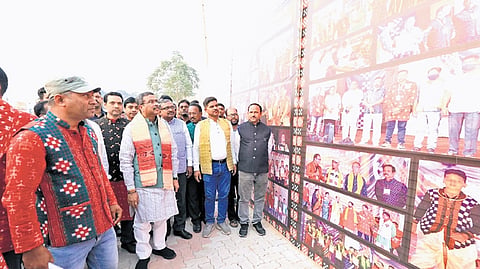 Pradhan at a photo exhibition during the national Sambalpuri Sammelan.