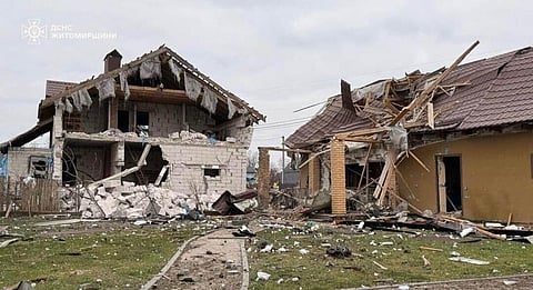 In this photo provided by the Ukrainian Emergency Service on Tuesday, Dec. 23, 2025, a residential house is seen damaged after a Russian strike in Zhytomyr region, Ukraine.