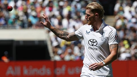 England's Ben Stokes prepares to deliver a ball to Australia on Day 2 of their Ashes cricket test match in Melbourne, Saturday, Dec. 27, 2025.