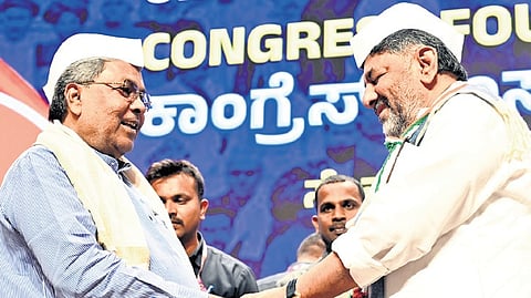 Chief Minister Siddaramaiah and DCM DK Shivakumar at the 140th Foundation Day of Congress at the KPCC office in Bengaluru on Sunday
