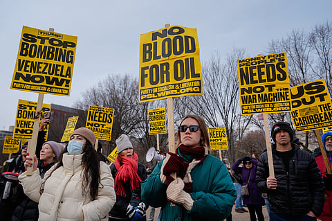 Protestors rally outside the White House, Saturday, Jan. 3, 2026, in Washington, after the U.S. captured Venezuelan President Nicolás Maduro and his wife in a military operation.