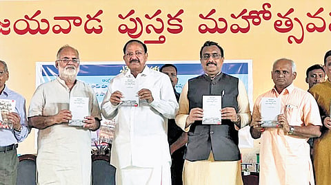 Former Vice-President of India M Venkaiah Naidu releases two books authored by nationalist thinker Ram Madhav, at Vijayawada Book Festival.