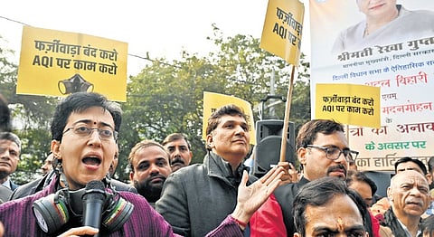 AAP leaders stage protest outside Delhi Assembly on the second day of the winter session on Tuesday drawing attention to worsening air pollution.