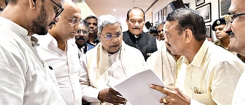 Karnataka Border Area Development Authority president Somanna Bevinamarada submits a memorandum to CM Siddaramaiah in Mangaluru on Saturday