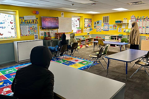 Children watch television at ABC Learning Center in Minneapolis, Minn., on Wednesday, Dec. 31, 2025.