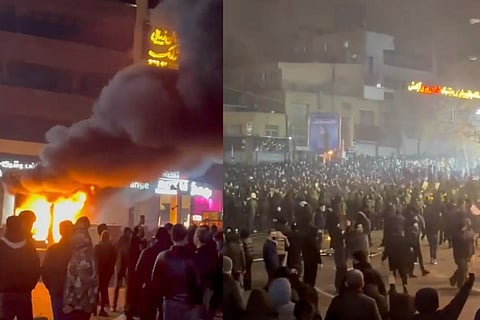 In this frame grab from video provided by The Associated Press shows a fire as people protest in Tehran, Iran, Friday, Jan. 9, 2026.
