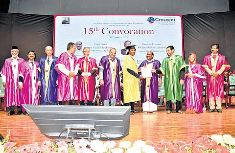 Minister Govi Chezhiaan distributing degree certificates to students on Sunday.
