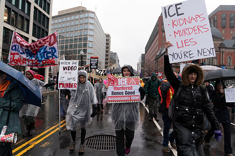 Demonstrators march outside the White House in Washington on Saturday, Jan. 10, 2026, against the Immigration and Customs Enforcement (ICE) agent who fatally shot Renee Nicole Good in Minneapolis.