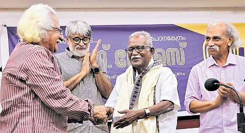 Adoor Gopalakrishnan felicitating M F Thomas during a function at the Press Club on Thursday, marking Thomas’ 80th birthday celebrations. Filmmakers Venu and M P Sukumaran Nair are also seen.