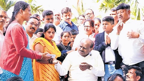 Union Minister for Heavy Industries HD Kumaraswamy celebrates Makar Sankranti with the differently abled at his farmhouse in Bidadi on Thursday.