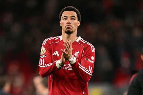 Liverpool's French striker #22 Hugo Ekitike applauds fans after the English Premier League football match between Liverpool and Burnley at Anfield in Liverpool, north west England on January 17, 2026.