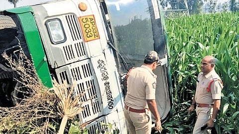 APSRTC bus heading to Vizianagaram from Rajam overturned in agriculture fields near Appannavalasa village under Garividi mandal.