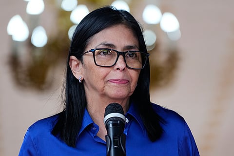 Venezuela's acting President Delcy Rodriguez makes a statement to the press at Miraflores presidential palace in Caracas, Venezuela, Wednesday, Jan. 14, 2026.