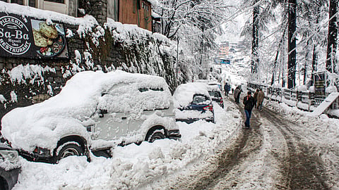 Vehicles covered in snow after fresh snowfall, at Manali in Kullu district, Himachal Pradesh, Saturday, Jan. 24, 2026.