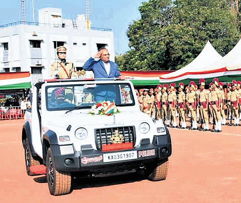 Mangaluru District In-charge Minister Dinesh Gundu Rao receives the guard
of honour on Monday