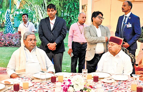 Chief Minister Siddaramaiah attends high tea with Governor Thaawarchand Gehlot at Lok Bhavan in Bengaluru on Sunday