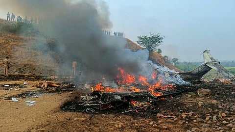 Maharashtra Deputy Chief Minister Ajit Pawar's plane in flames after it crashed during landing, at Baramati in Pune district, Maharashtra, Wednesday, Jan. 28, 2026.