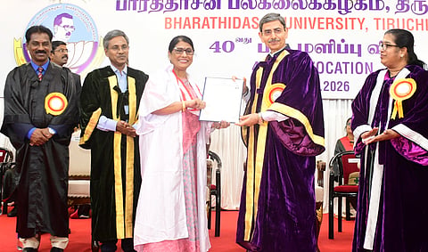 Madras High Court Justice R N Manjula receives her PhD from Governor RN Ravi during BDU’s 40th convocation in Tiruchy on Wednesday.