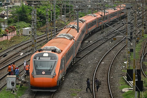 A Vande Bharat train passes over the Vijayawada railway station on Tuesday.
