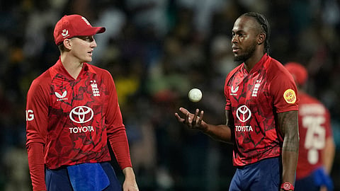 England's captain Harry Brook, left, talks with Jofra Archer during the first T20 cricket match between England and Sri Lanka in Pallekele, Sri Lanka, Friday, Jan. 30, 2026.