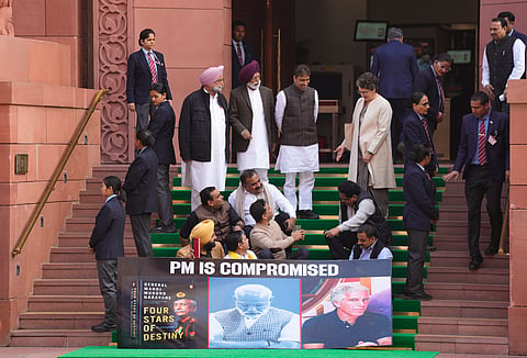 Congress MP Priyanka Gandhi Vadra with Lok Sabha MPs who were suspended on Tuesday.
