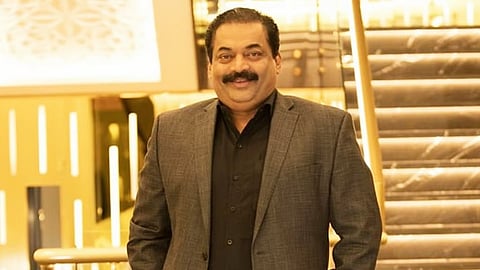 Confident Group chairman CJ Roy